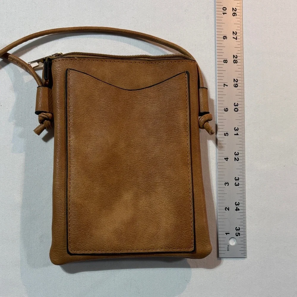 Elegant Tan Crossbody Leather Bag with Buckle Accents - Picture 4 of 9